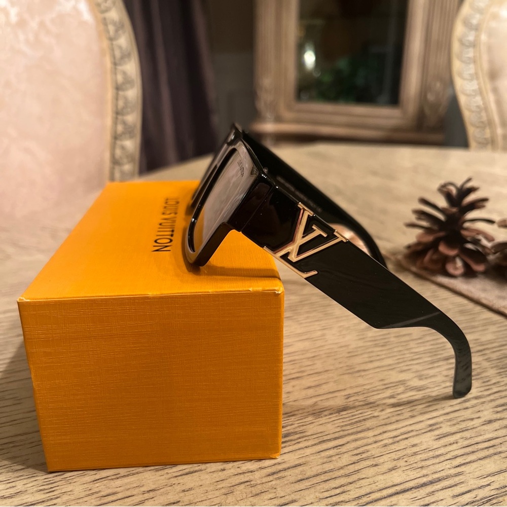 Louis Vuitton Black Sunglasses with Gold Logo, retails $895